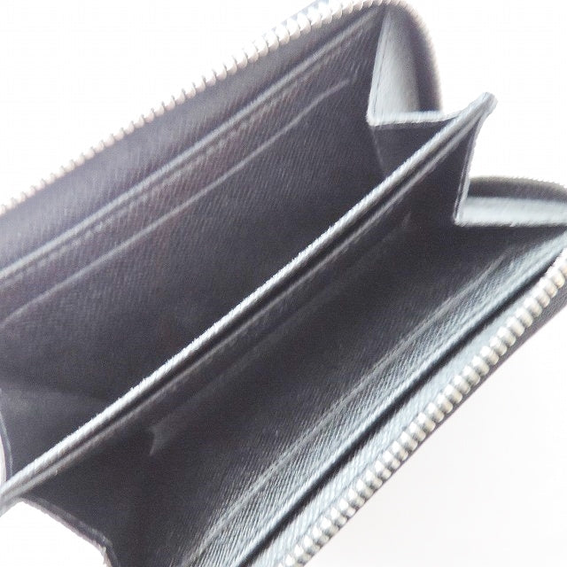 Louis Vuitton Porte Monnaie Zippy Canvas Wallet ()