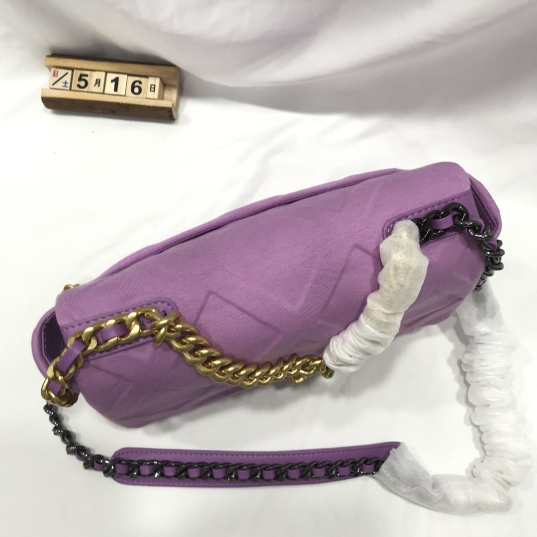 Designer bags by Chanel 196