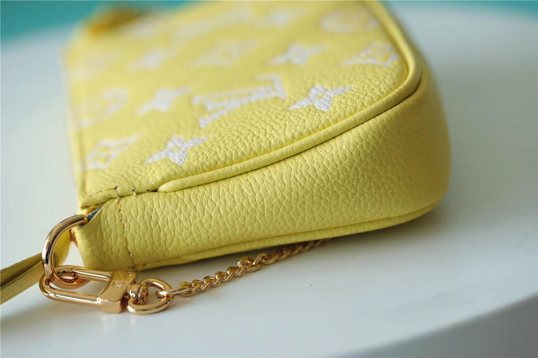 LV Mini Pochette AcGLAMIssoires Monogram Empreinte Lemon Curd Yellow For Women, Shoulder And Crossbody Bags 15.5cm/6.1in LV M46129