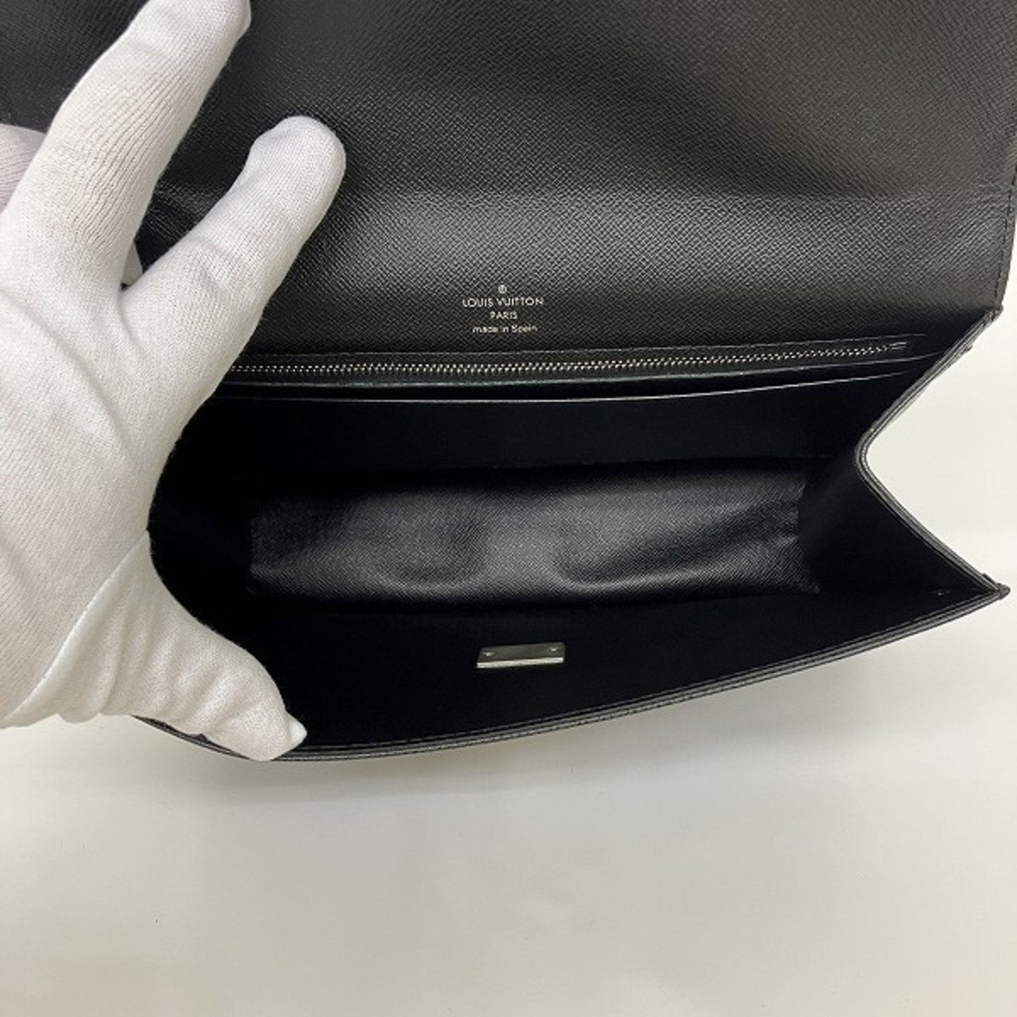 Louis Vuitton Selenga Leather Clutch Bag ()
