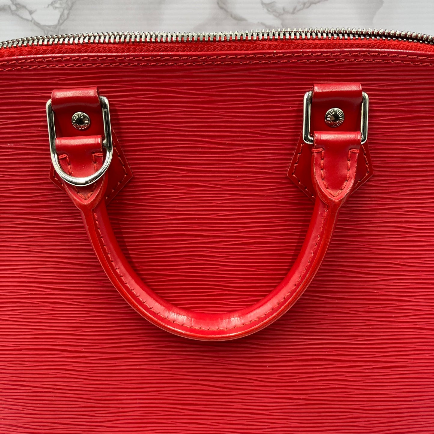 LOUIS VUITTON Epi Alma PM Handbag