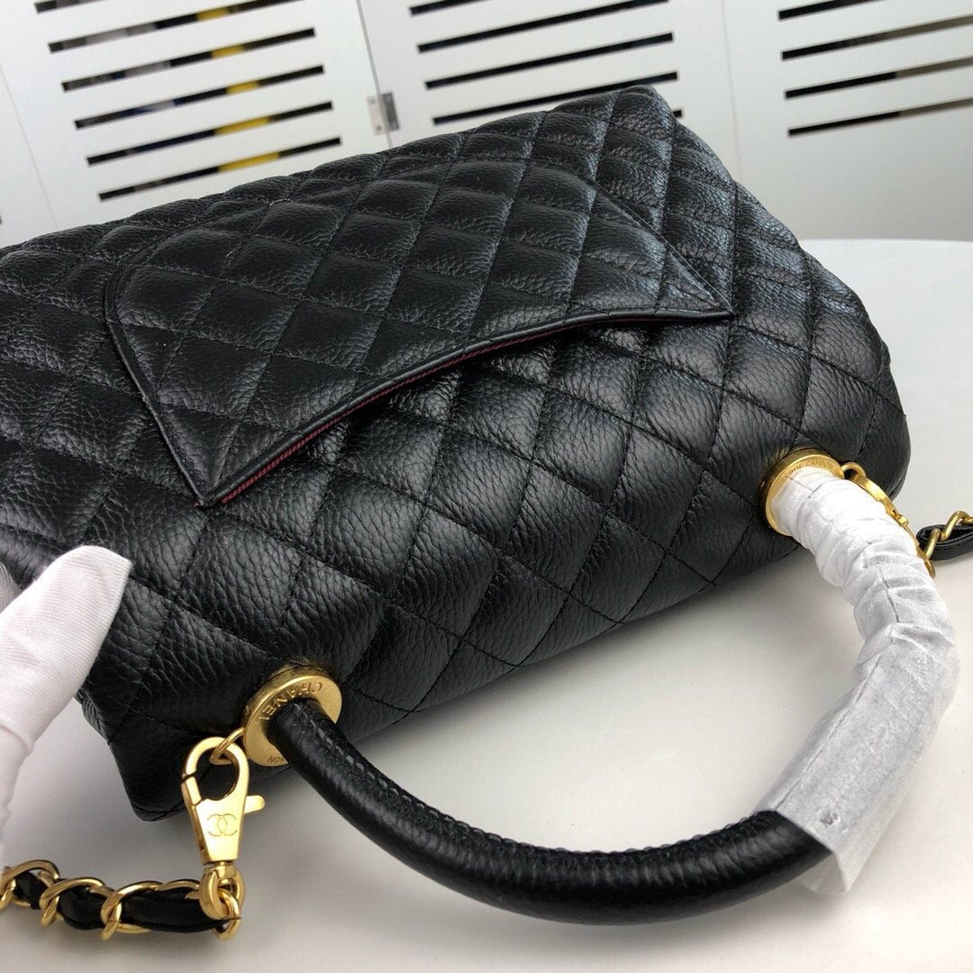 Designer bags by Chanel 218