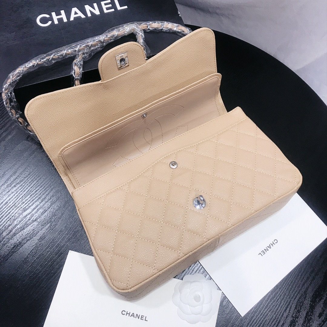 Designer bags by Chanel 209