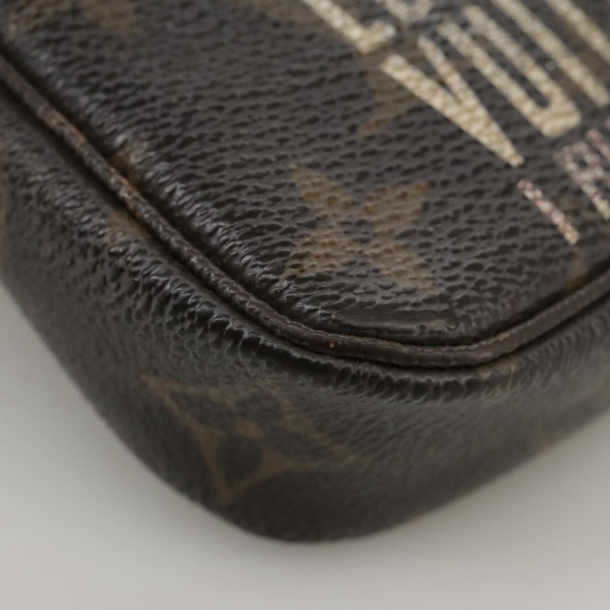 LOUIS VUITTON Monogram Label Mini Pochette Accessoires Pouch M63798 104504