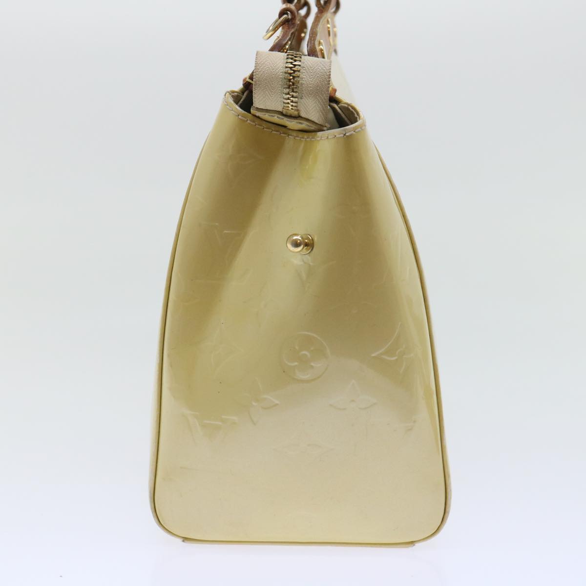 Sophisticated Beige Patent Leather Handbag