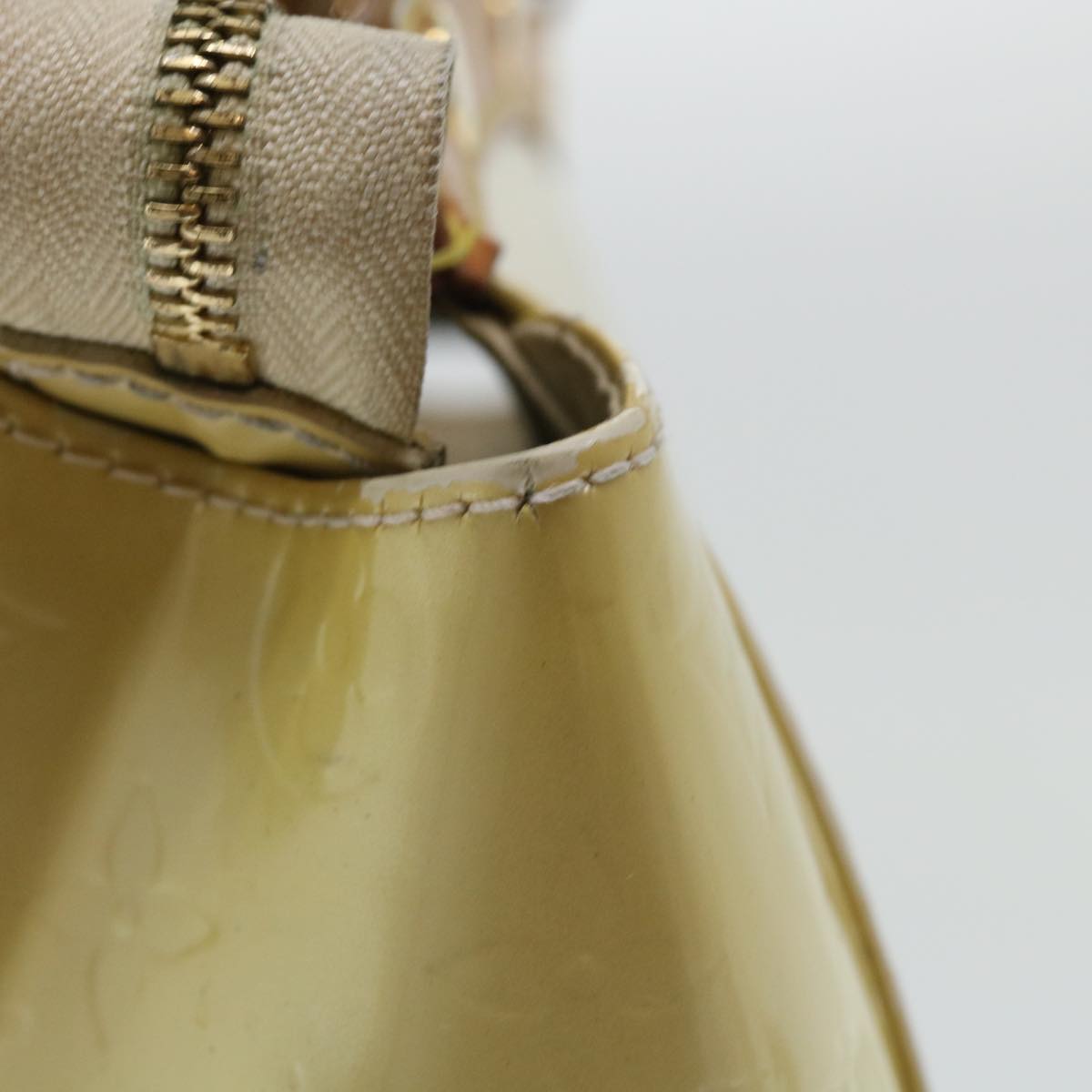 Sophisticated Beige Patent Leather Handbag