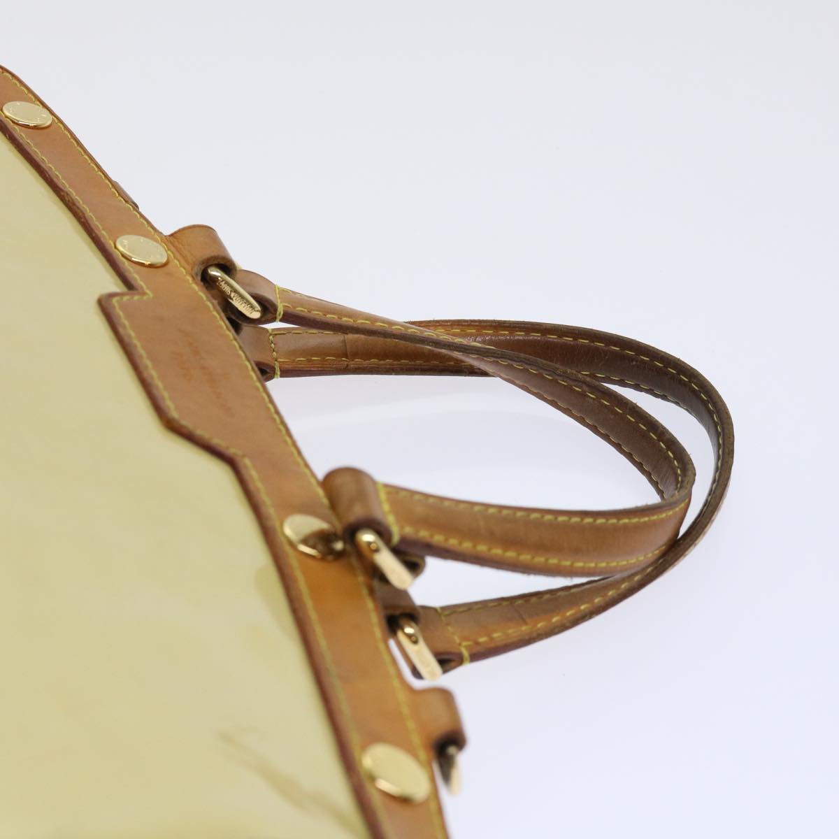 Sophisticated Beige Patent Leather Handbag