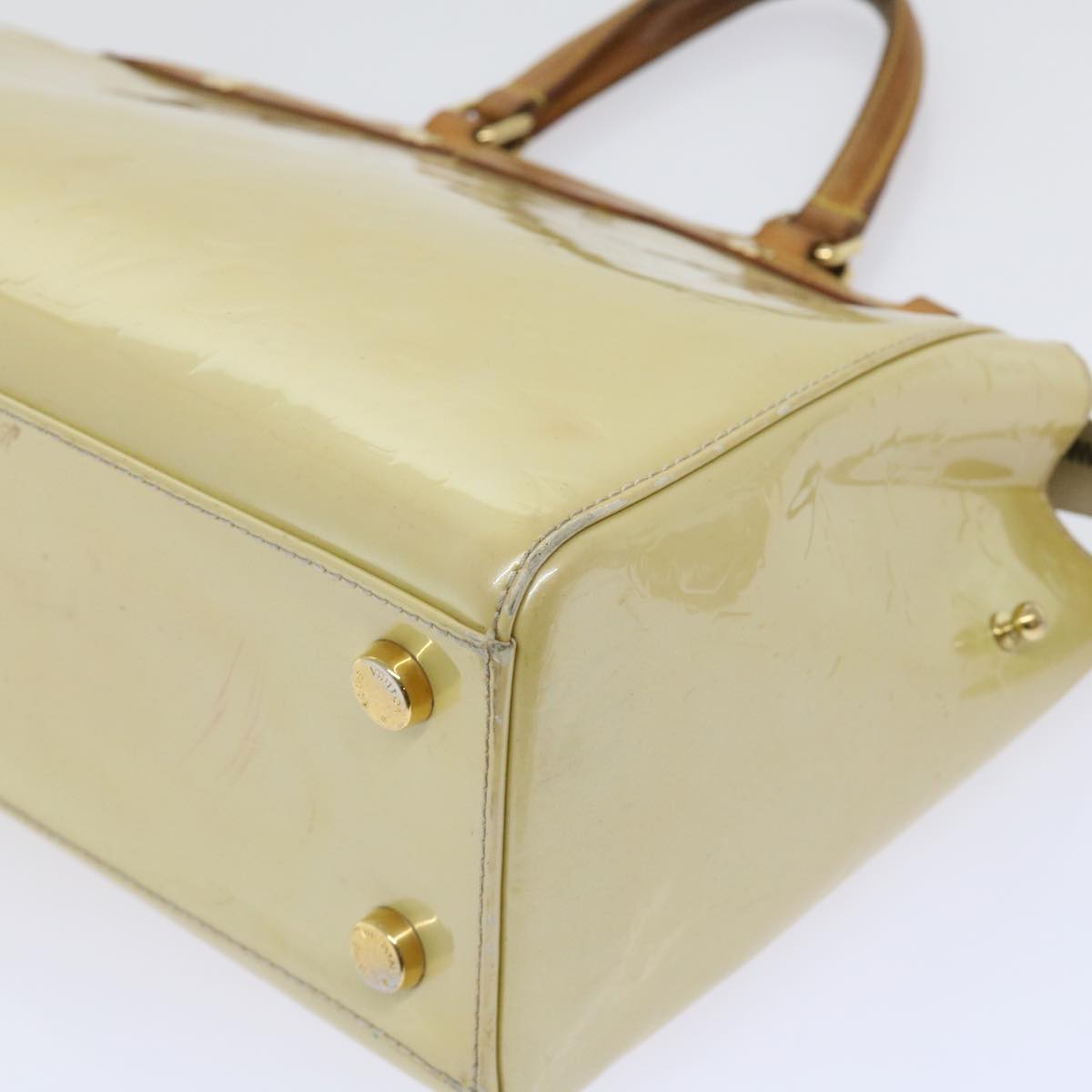 Sophisticated Beige Patent Leather Handbag