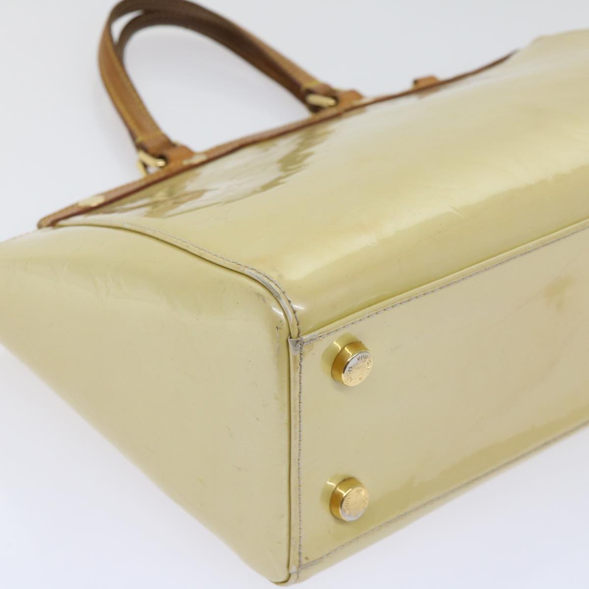Sophisticated Beige Patent Leather Handbag