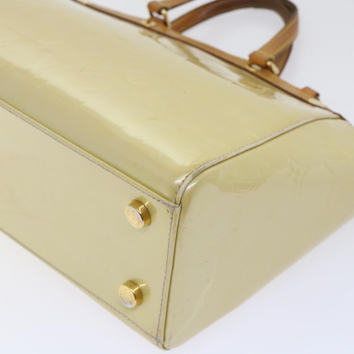 Sophisticated Beige Patent Leather Handbag