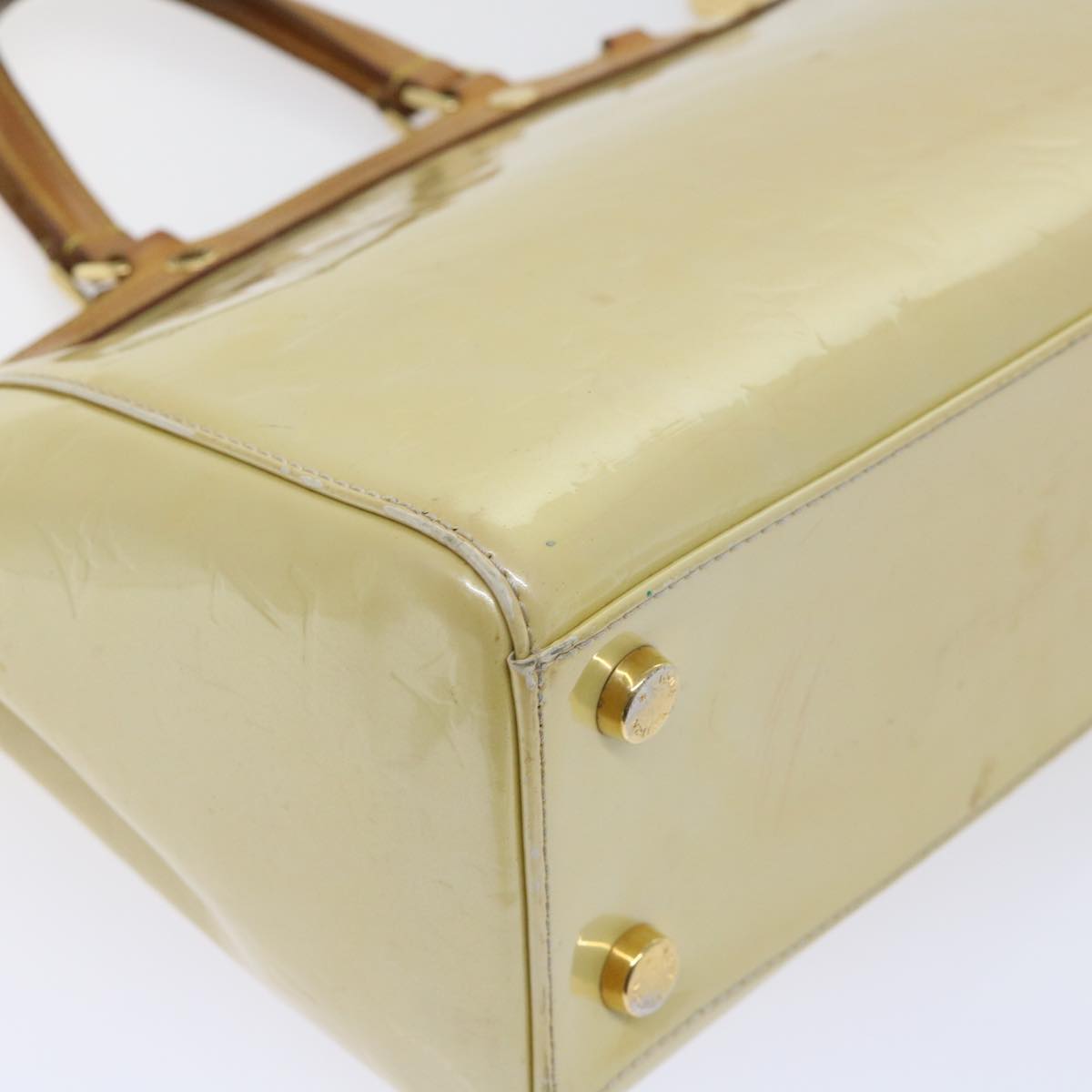 Sophisticated Beige Patent Leather Handbag