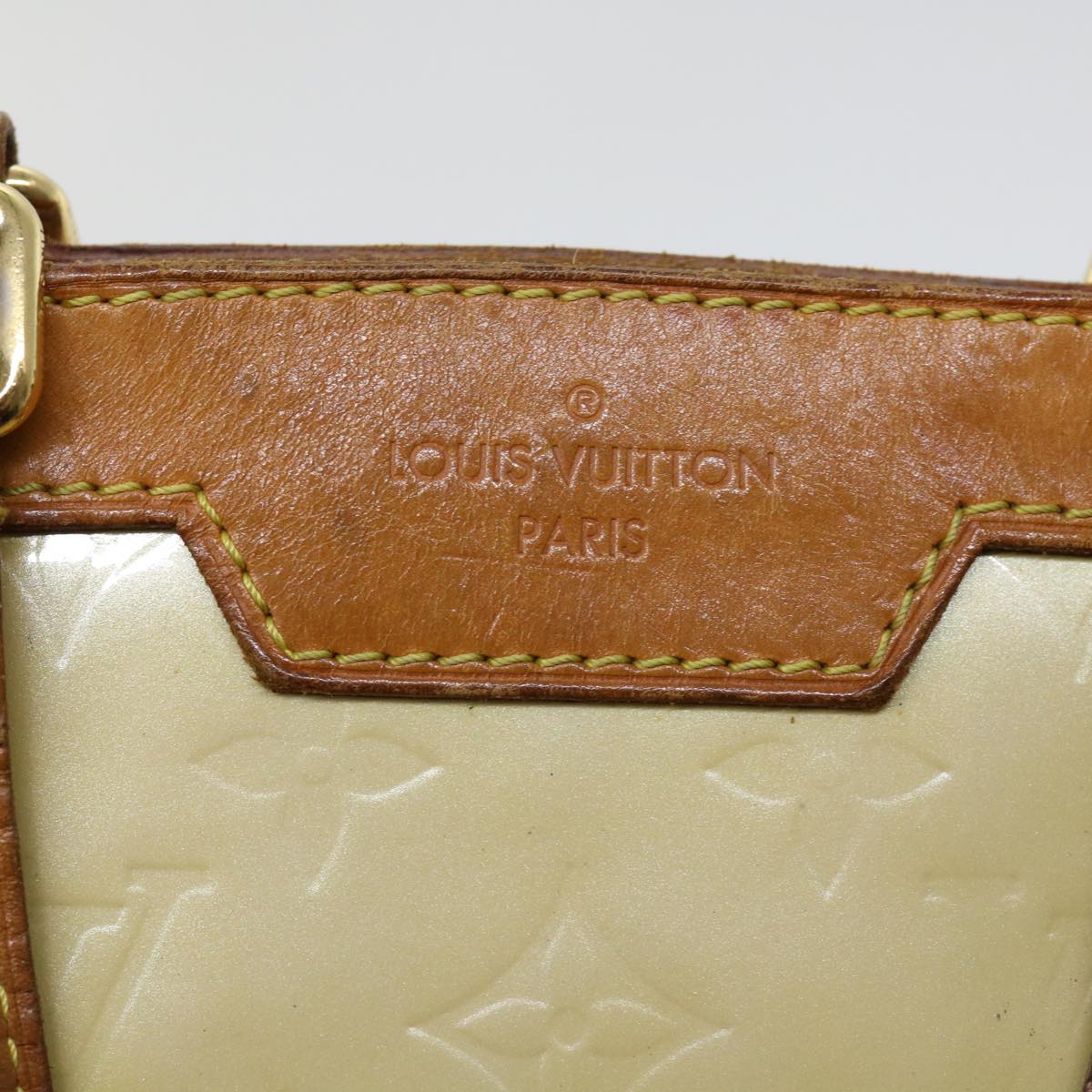 Sophisticated Beige Patent Leather Handbag