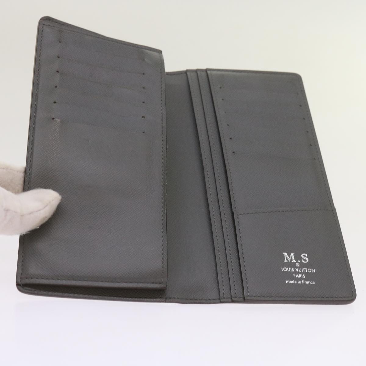 Sophisticated Taiga Leather Long Wallet with Ample SpaceEssentials