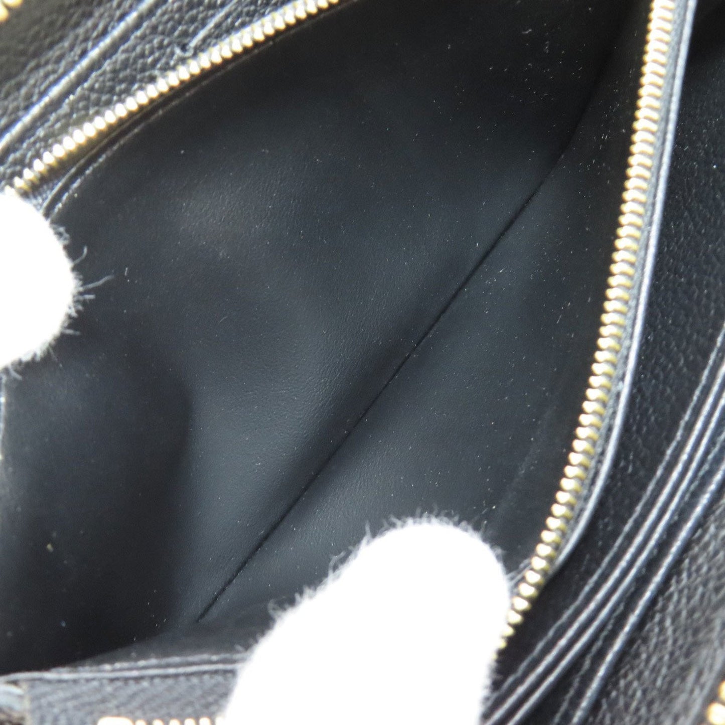 Zippy Wallet Empreinte Leather M60543