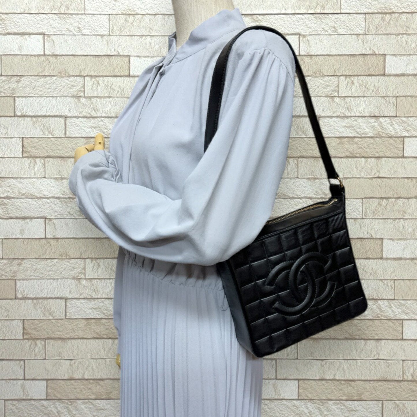 Chanel Leather Chocolate Bar Handbag with Minimal Scratches and Sleek Design