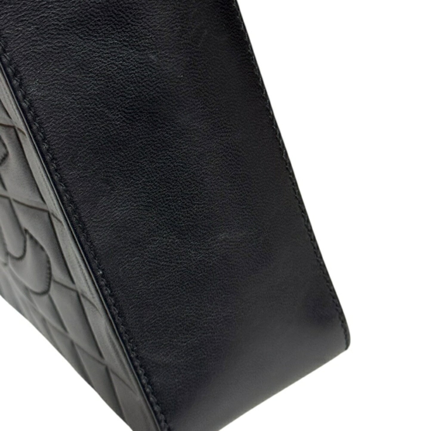 Chanel Leather Chocolate Bar Handbag with Minimal Scratches and Sleek Design