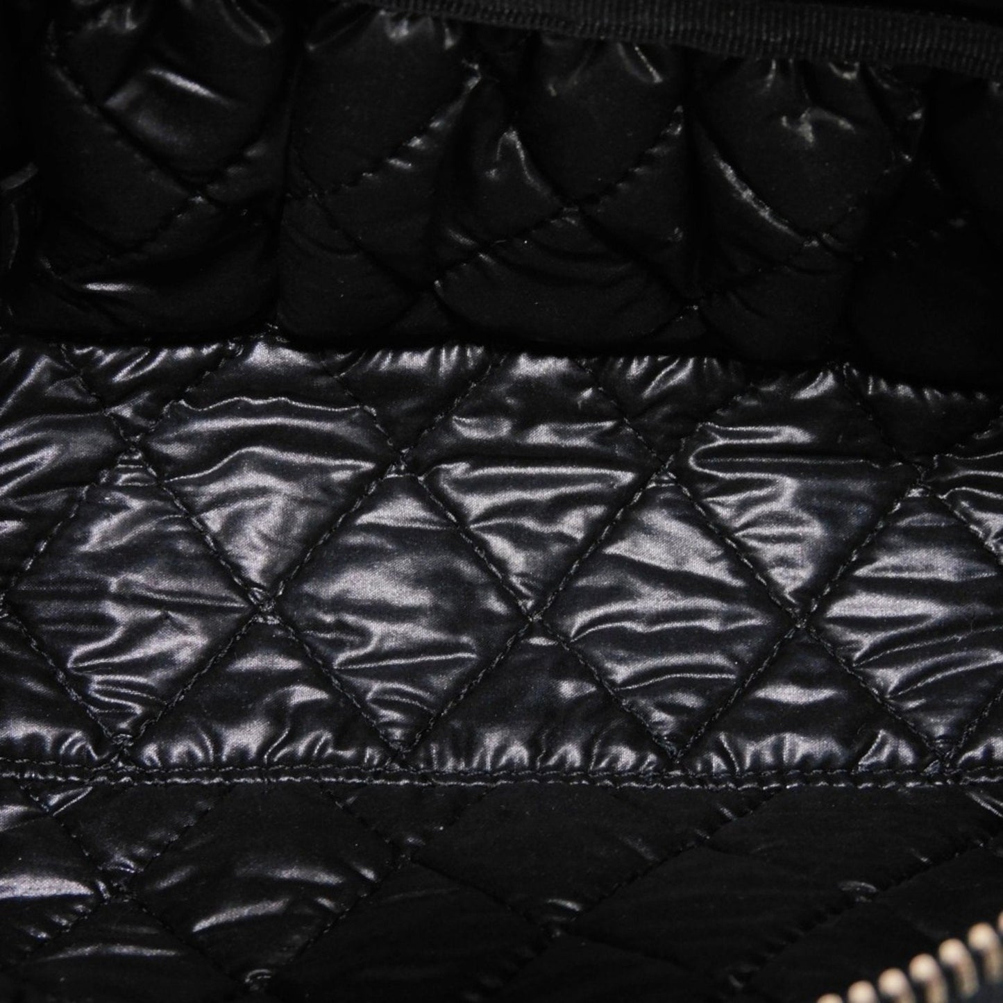Chanel Camellia Synthetic Handbag with Metal Fittings
