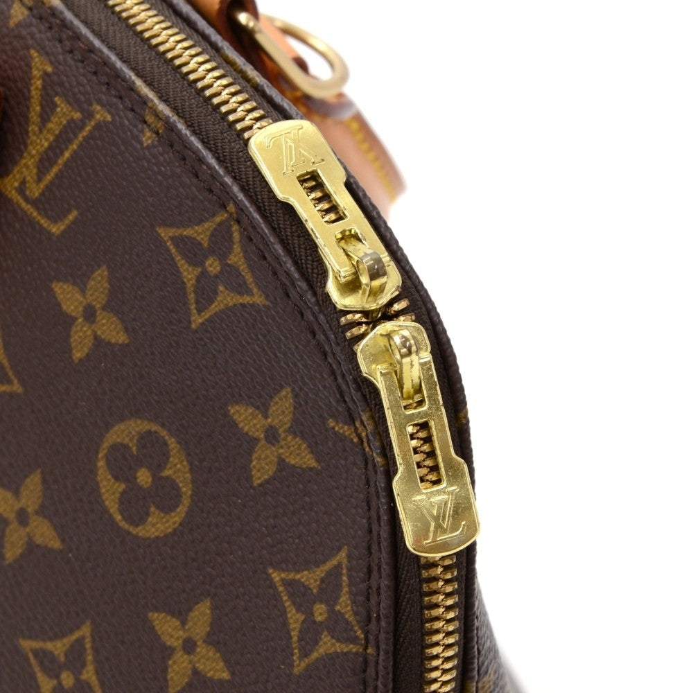 Louis Vuitto Alma Monogram Canvas Handbag