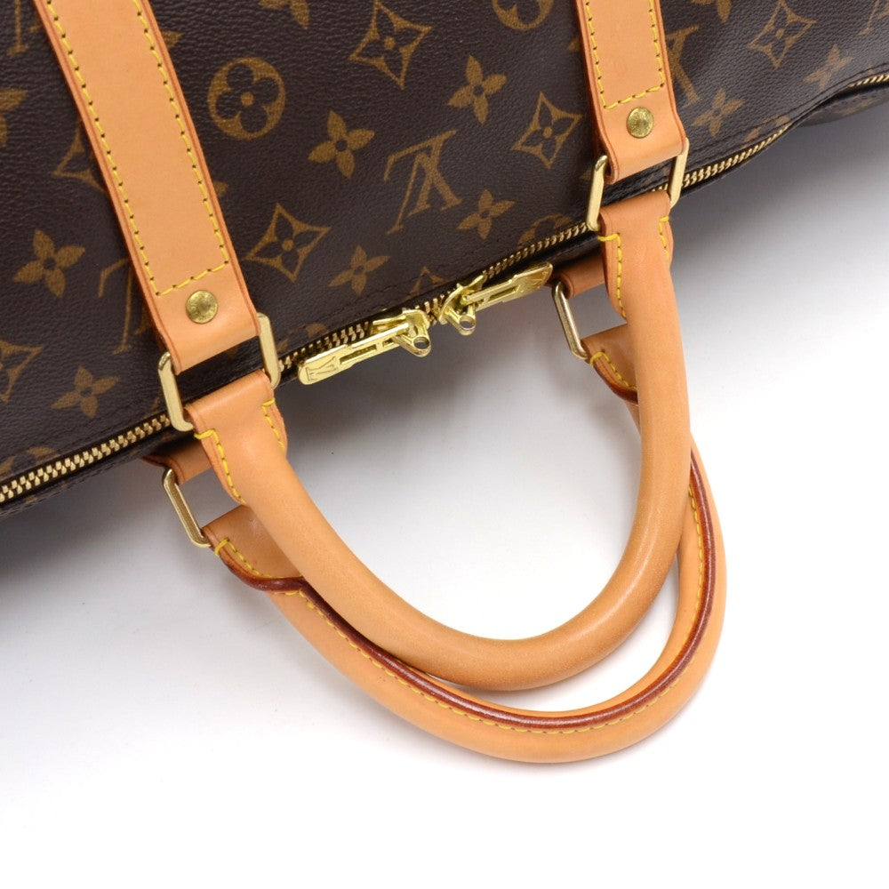 Louis Vuitto Keepall 55 Monogram Canvas Travel Bag