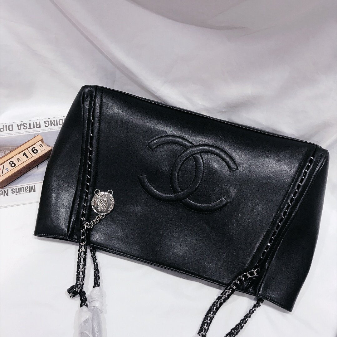 Designer bags by Chanel 210