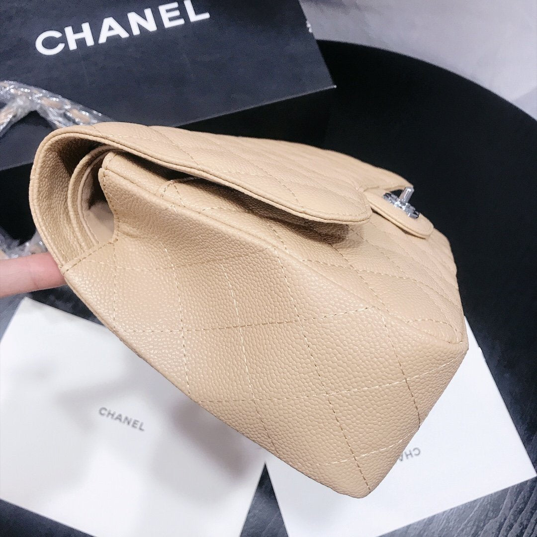Designer bags by Chanel 209