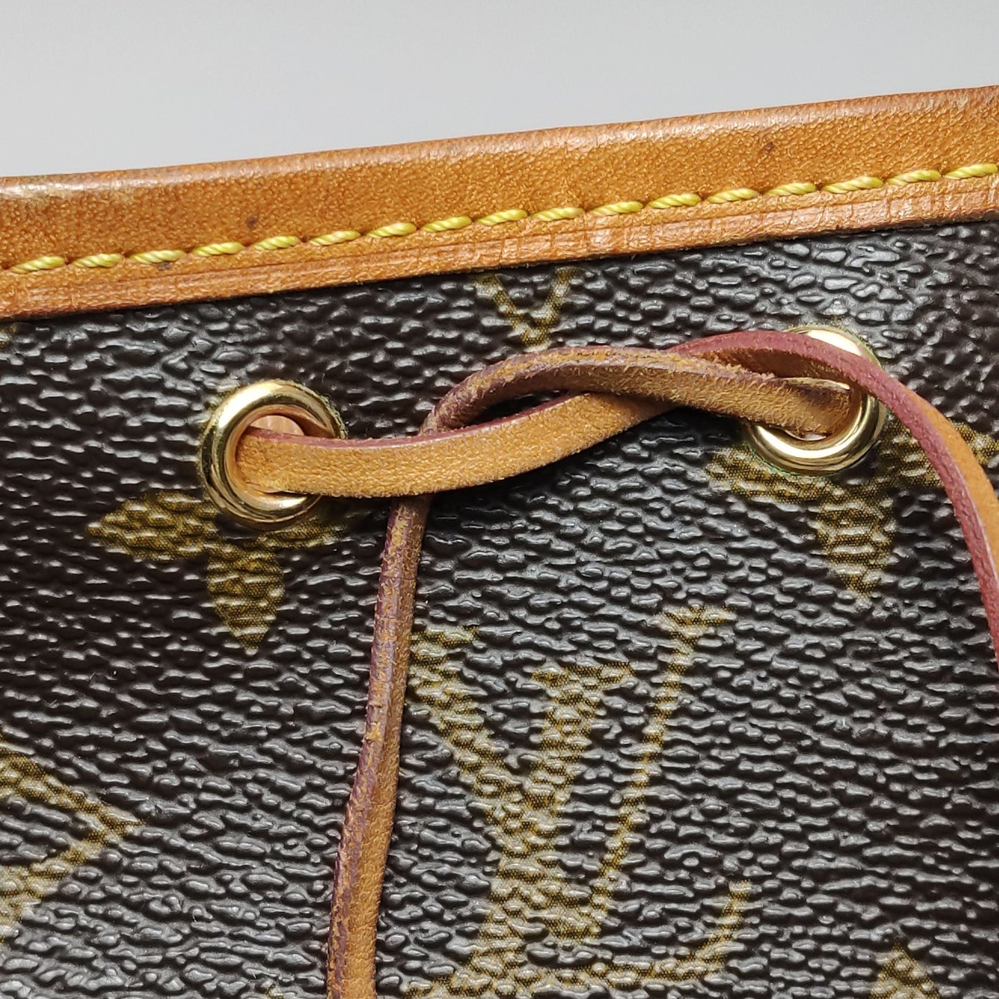 Preloved GLM-NOE Nano Monogram Drawstring Crossbody Bag 250522781203521