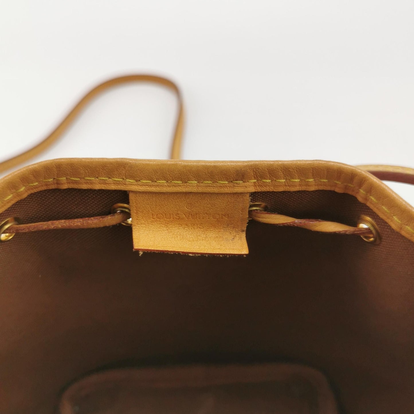 Preloved GLM-NOE Nano Monogram Drawstring Crossbody Bag 250429781171571