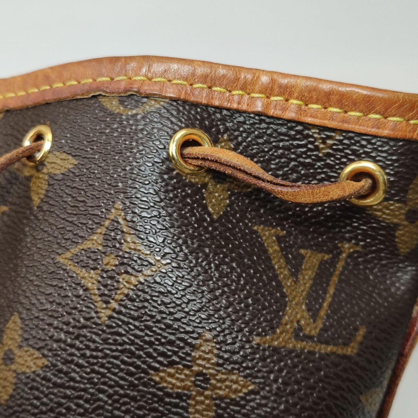 Preloved GLM-NOE Nano Monogram Drawstring Crossbody Bag 250411781143599
