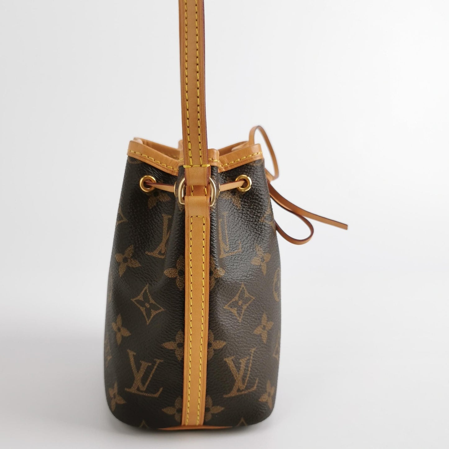 Preloved GLM-NOE Nano Monogram Drawstring Crossbody Bag 250630781258964