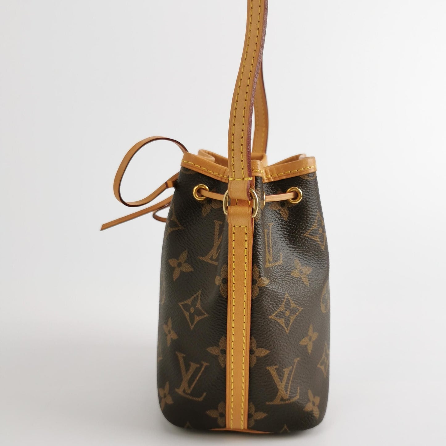 Preloved GLM-NOE Nano Monogram Drawstring Crossbody Bag 250630781258964