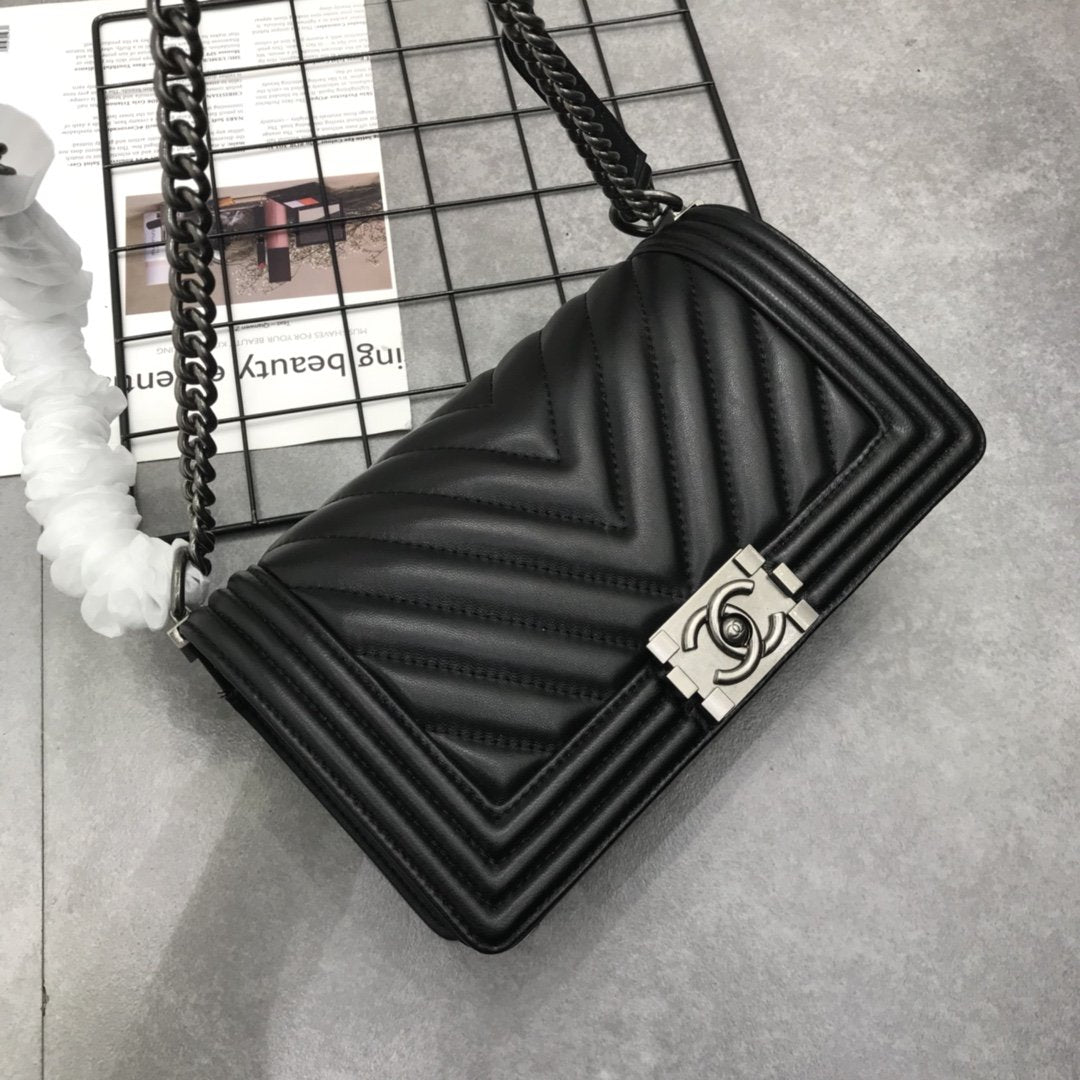 Designer bags by Chanel 177