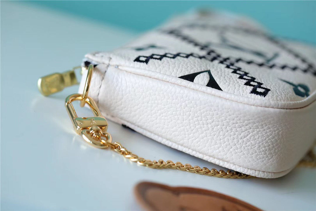 LV Mini Pochette AcGLAMIssoires Monogram Empreinte White For Women, WomenÃ¢â‚¬â„¢s Handbags, Shoulder Bags And Crossbody Bags 6.1in/15.5cm LVÃ‚Â 