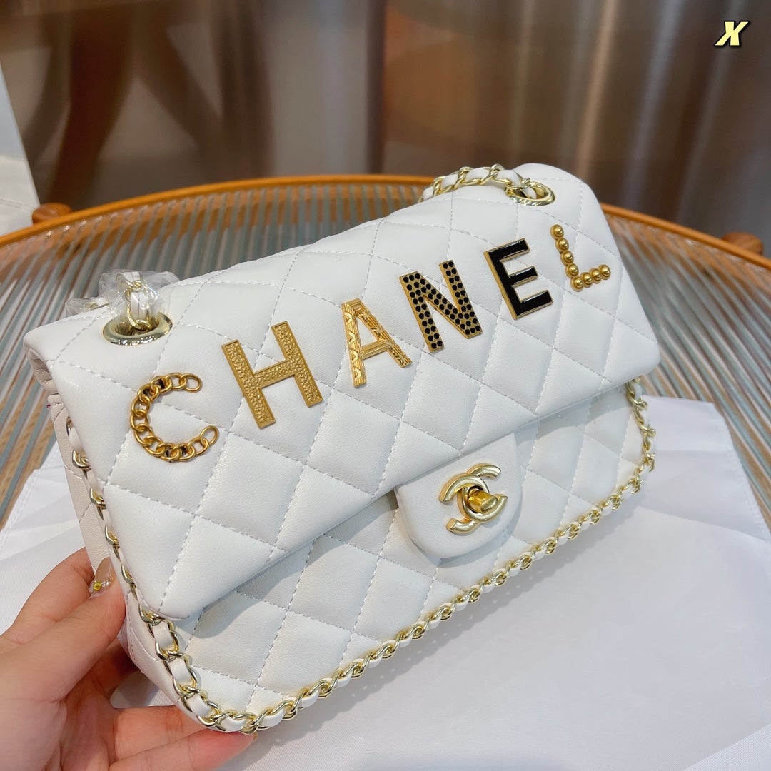 Designer bags by Chanel 295