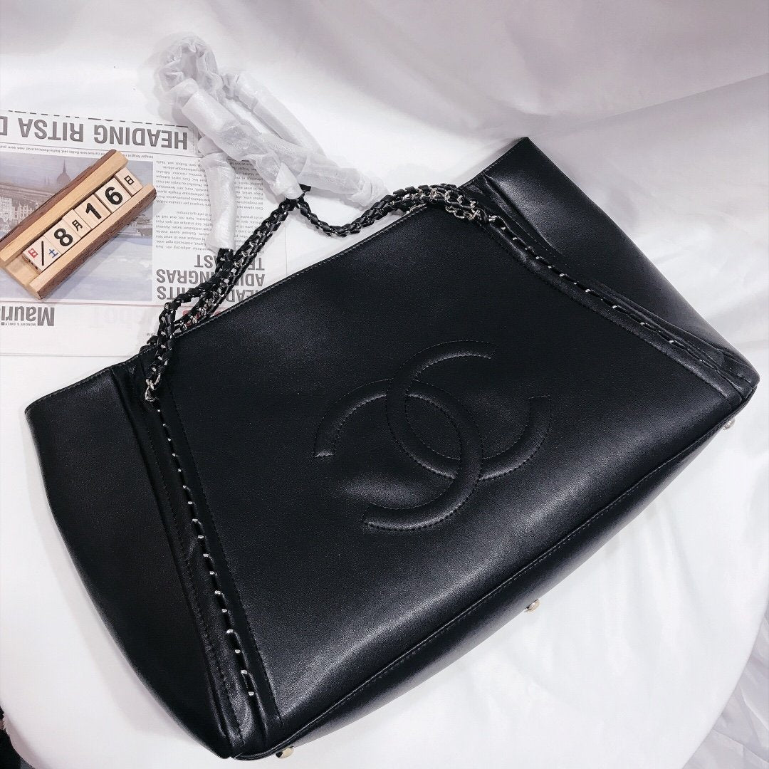 Designer bags by Chanel 210