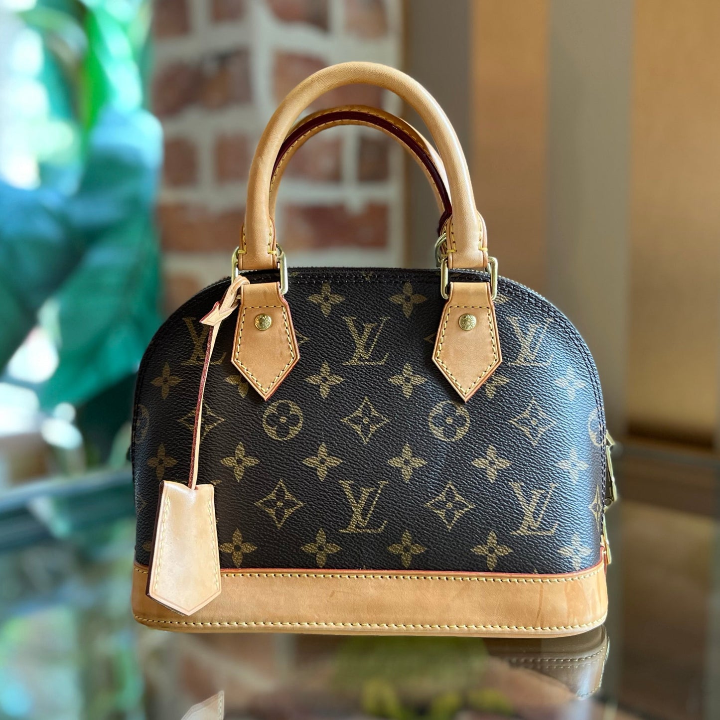 LOUIS VUITTON Alma BB Monogram Canvas Satchel