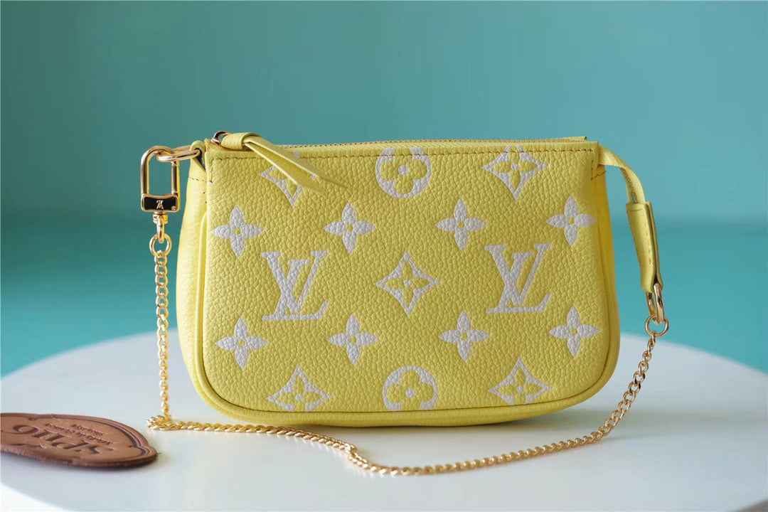 LV Mini Pochette AcGLAMIssoires Monogram Empreinte Lemon Curd Yellow For Women,  Shoulder And Crossbody Bags 15.5cm/6.1in LV M46129