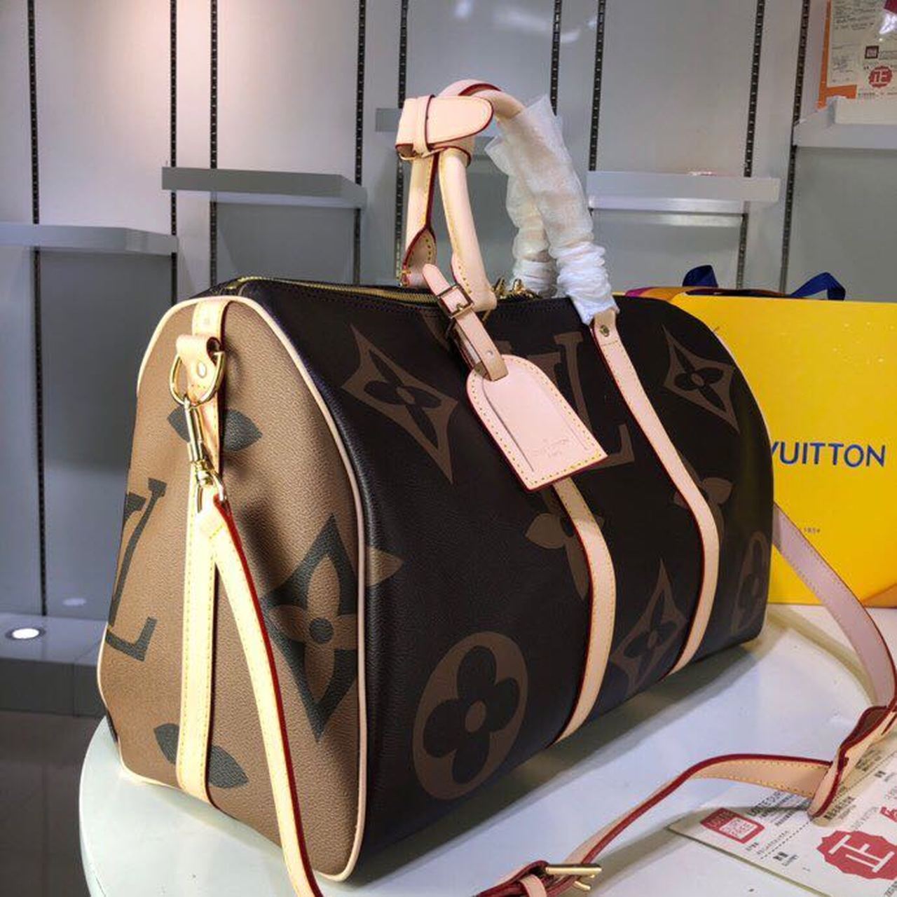 LV Keepall Bandouliere 50 Monogram and Monogram Reverse Canvas For Women, WomenÃ¢â‚¬â„¢s Handbags, Travel Bags 19.7in/50cm LV M44739