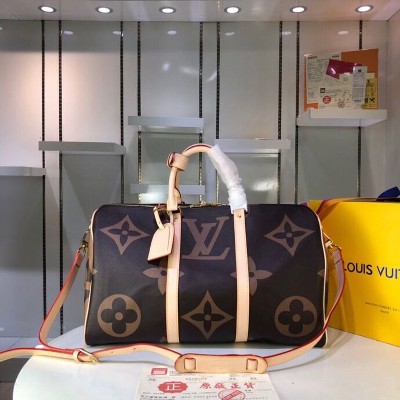 LV Keepall Bandouliere 50 Monogram and Monogram Reverse Canvas For Women, WomenÃ¢â‚¬â„¢s Handbags, Travel Bags 19.7in/50cm LV M44739