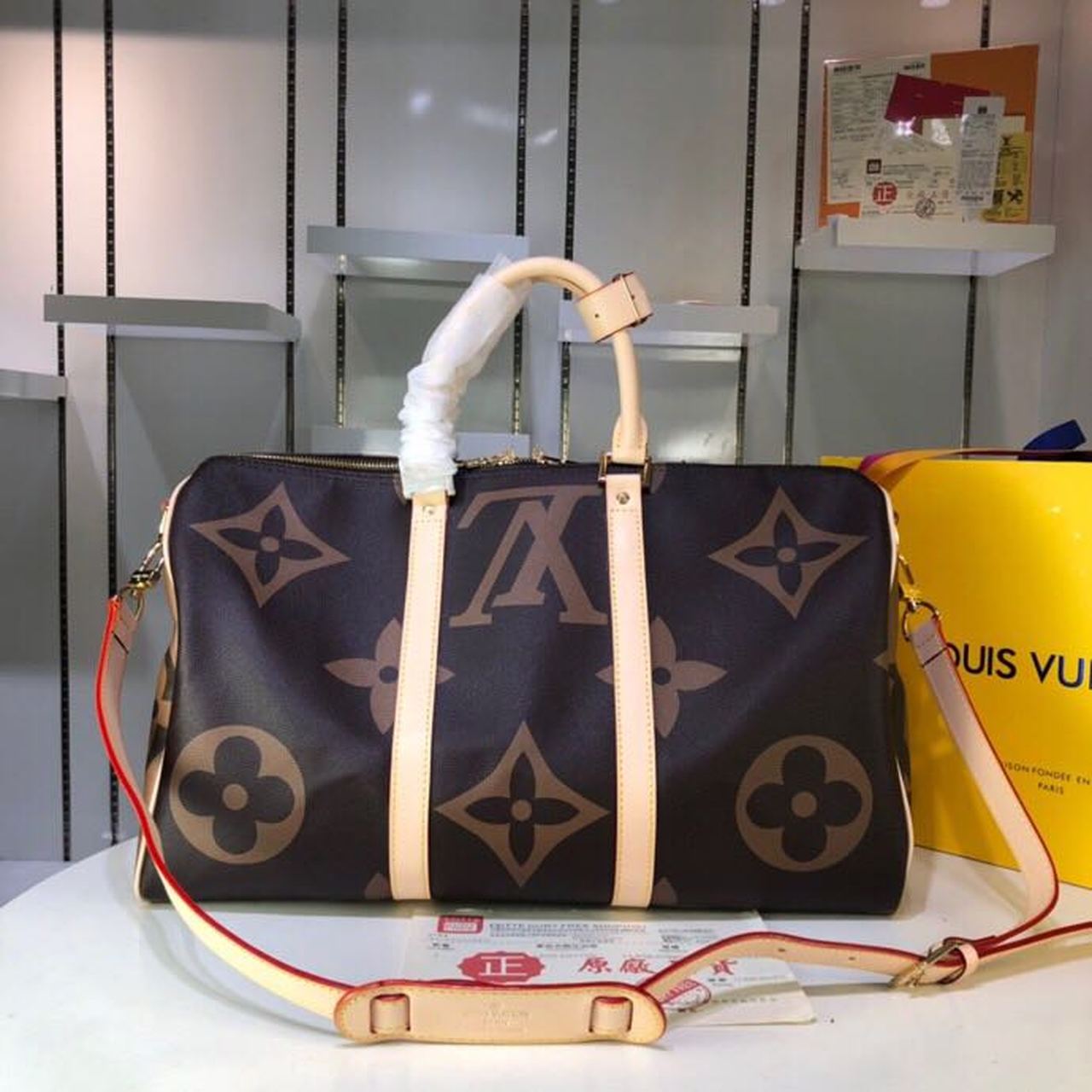 LV Keepall Bandouliere 50 Monogram and Monogram Reverse Canvas For Women, WomenÃ¢â‚¬â„¢s Handbags, Travel Bags 19.7in/50cm LV M44739