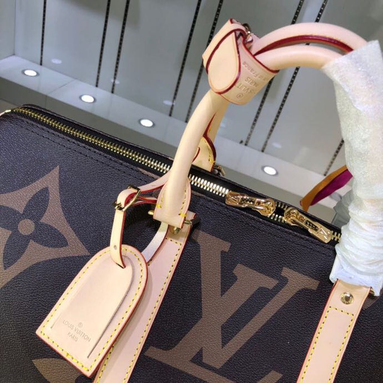 LV Keepall Bandouliere 50 Monogram and Monogram Reverse Canvas For Women, WomenÃ¢â‚¬â„¢s Handbags, Travel Bags 19.7in/50cm LV M44739