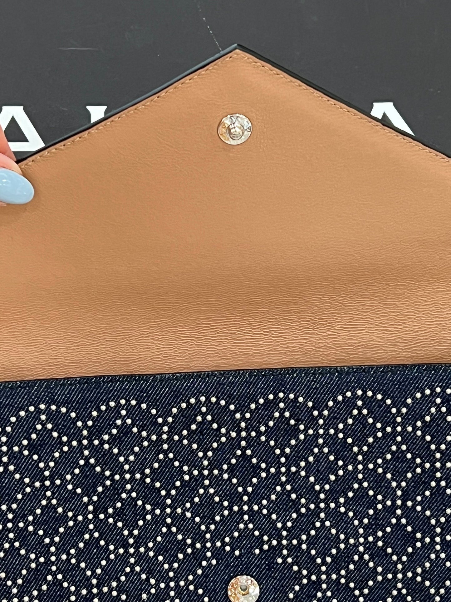 ALAÏA OUM ARABESQUE STUDDED ENVELOPE CLUTCH BAG