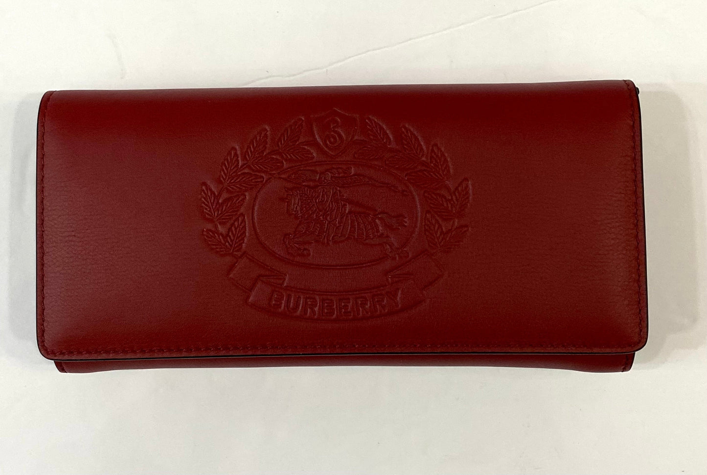 BURBERRY EQUESTRIAN KNIGHT EMBOSSED CALFSKIN LEATHER LONG WALLET