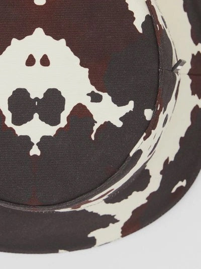 BURBERRY LOGO PATCH COW PRINT BUCKET HAT