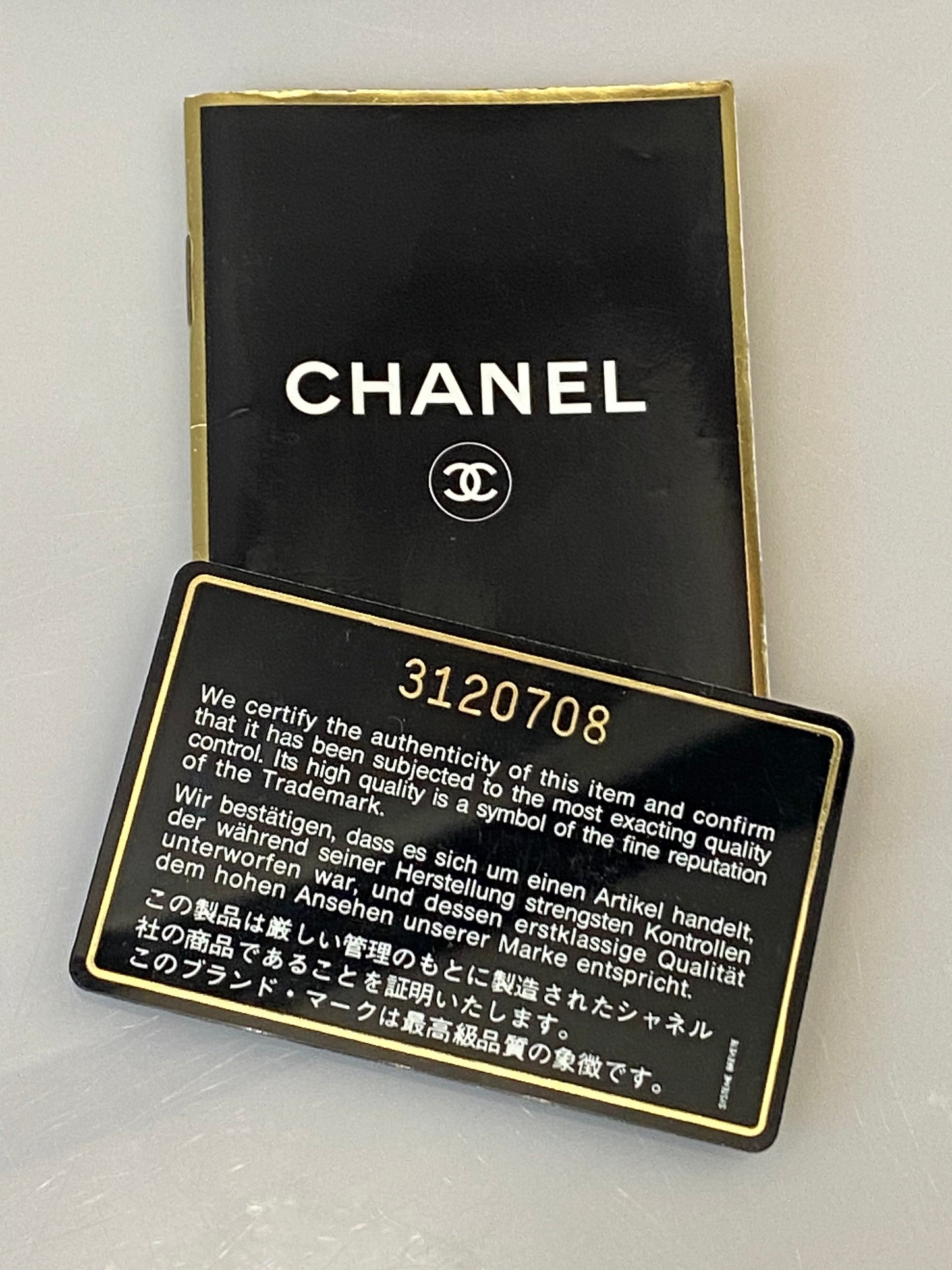 CHANEL TIMELESS QUILTED LAMBSKIN SMALL TASSEL CAMERA BAG