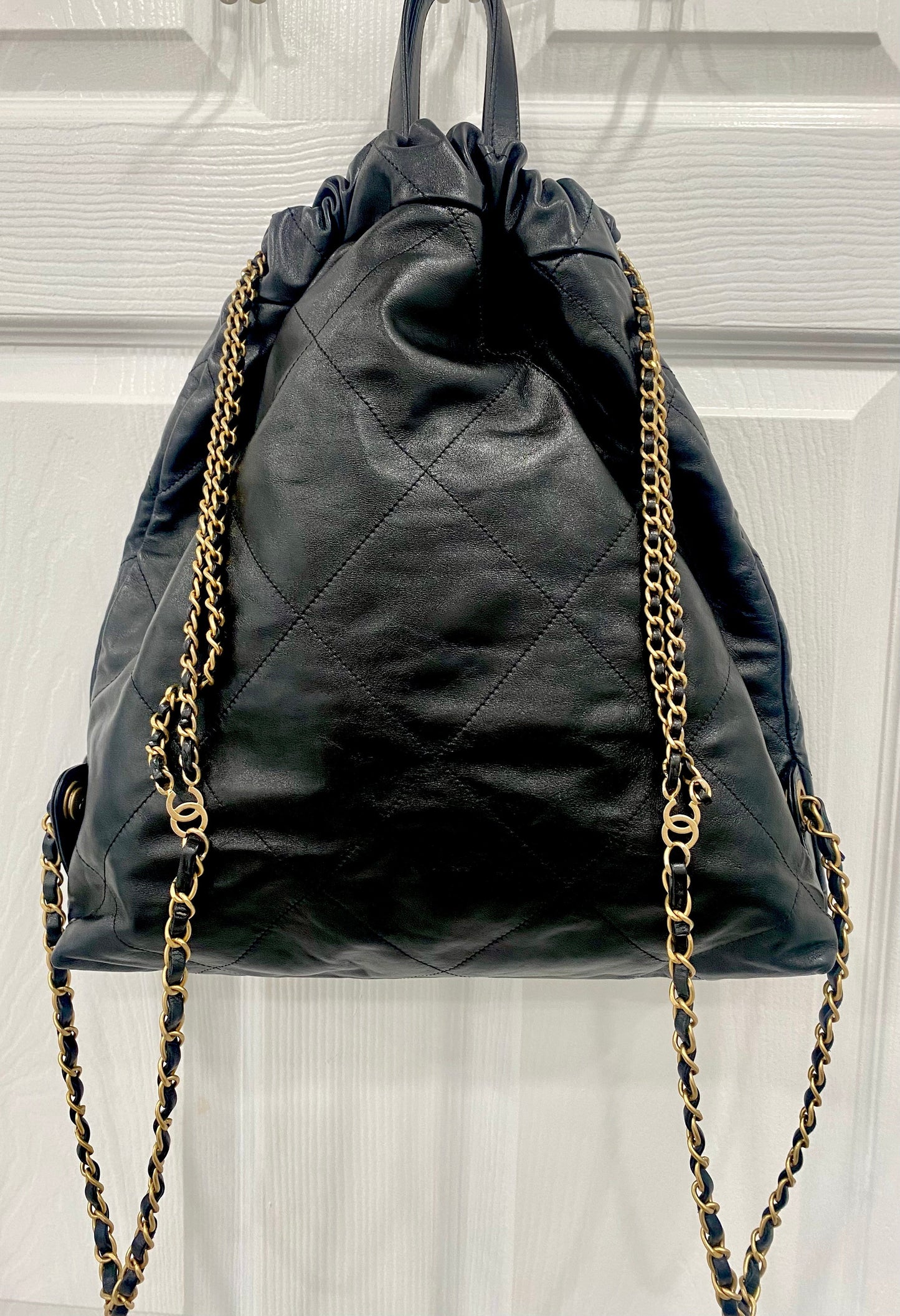 CHANEL SHINY QUILTED CALFSKIN LEATHER CHANEL 22 BACKPACK