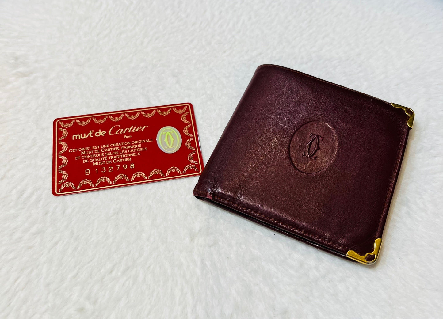 CARTIER VINTAGE MUST DE CARTIER LEATHER BI-FOLD WALLET
