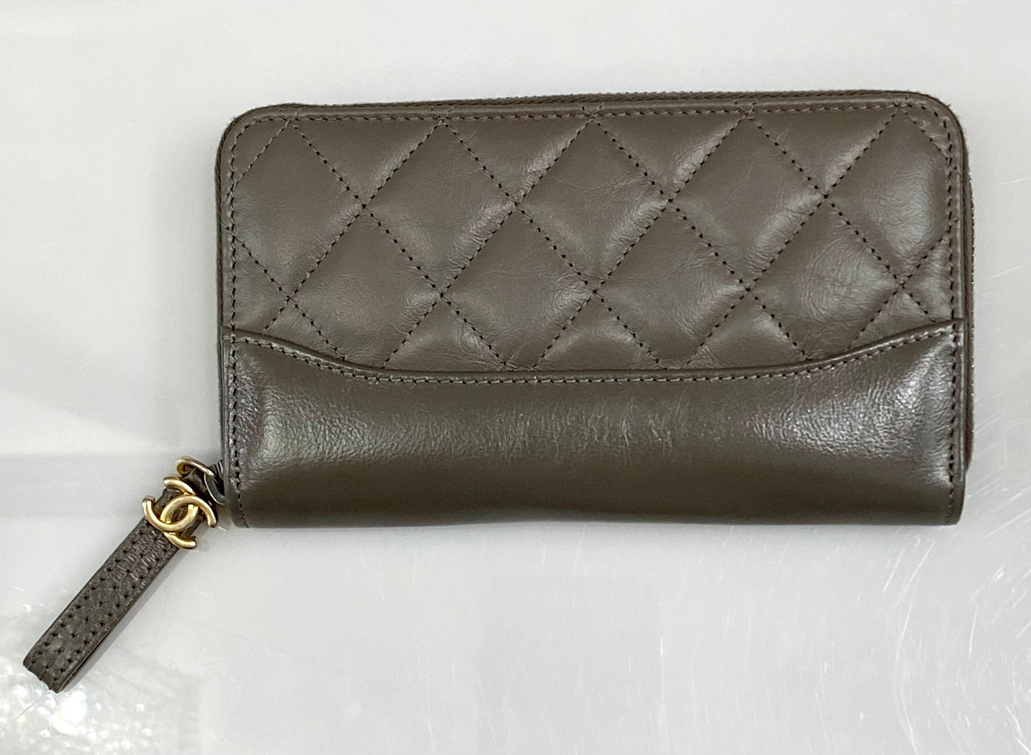 CHANEL QUILTED AGED CALFSKIN SMALL GABRIEL ZIPPY WALLET