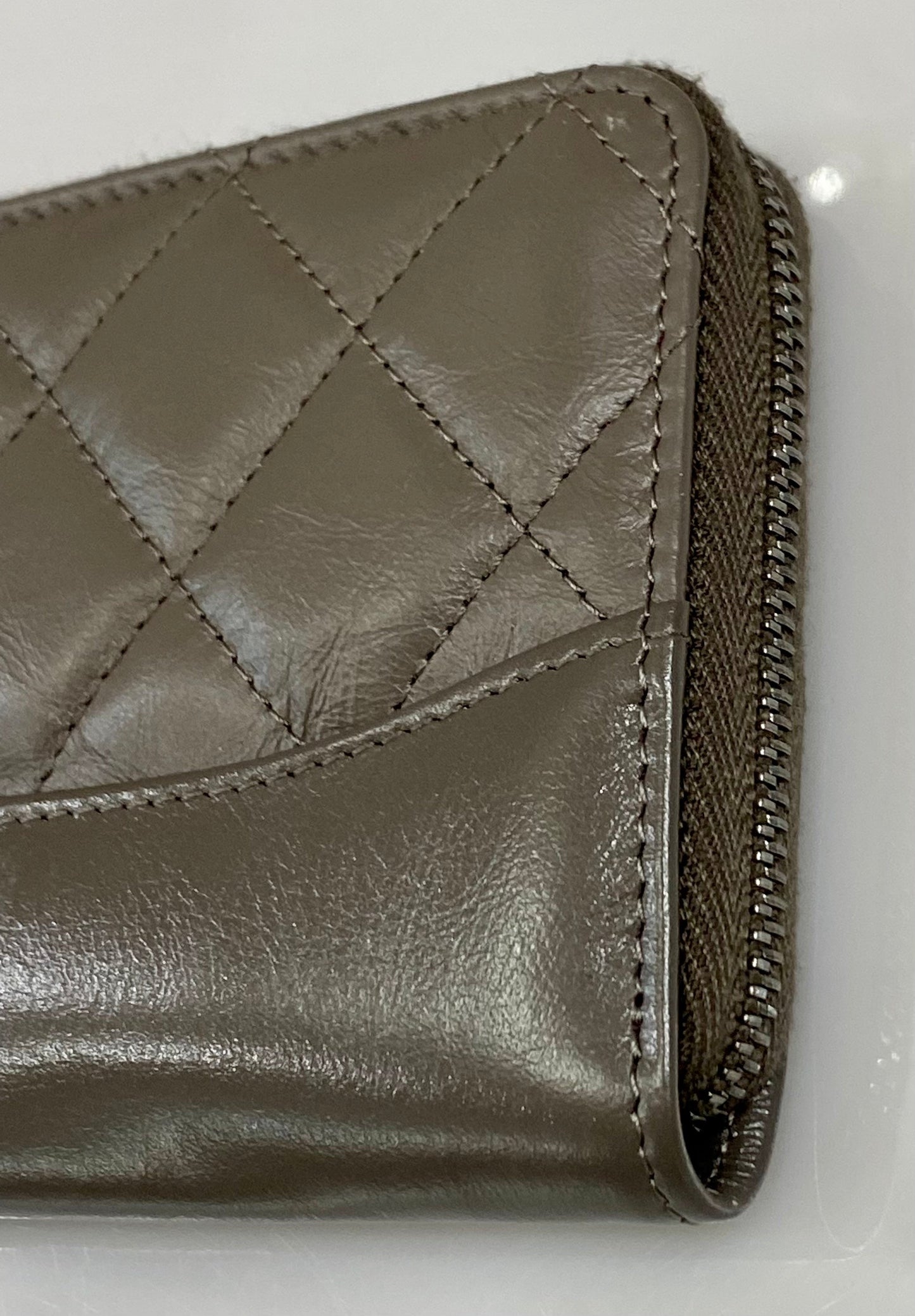 CHANEL QUILTED AGED CALFSKIN SMALL GABRIEL ZIPPY WALLET
