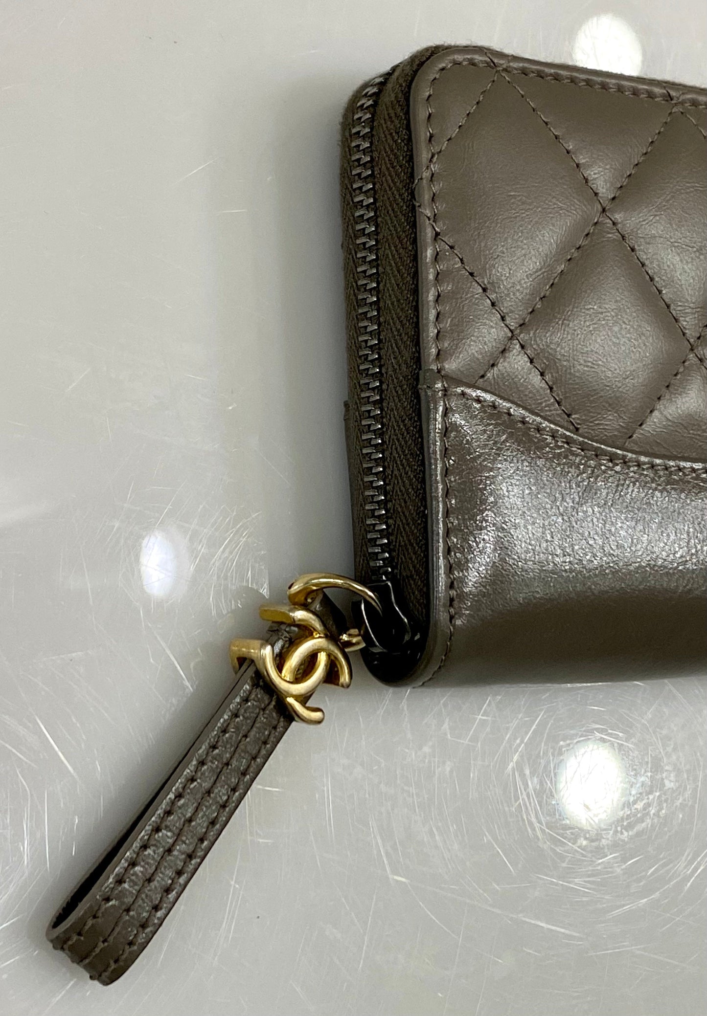 CHANEL QUILTED AGED CALFSKIN SMALL GABRIEL ZIPPY WALLET
