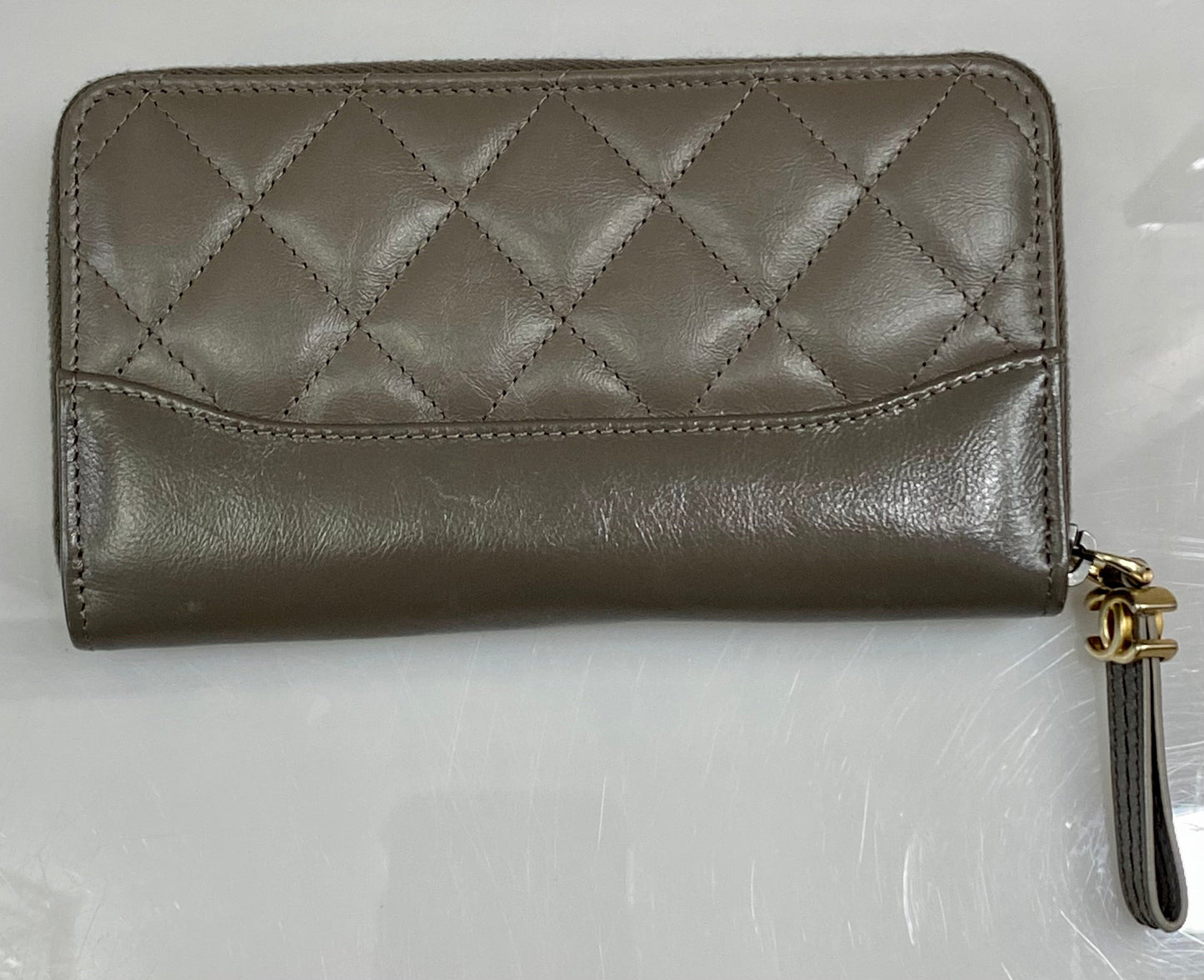 CHANEL QUILTED AGED CALFSKIN SMALL GABRIEL ZIPPY WALLET